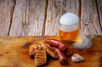 Beer with crispy fish hors d'oeuvres, World Beer Day.